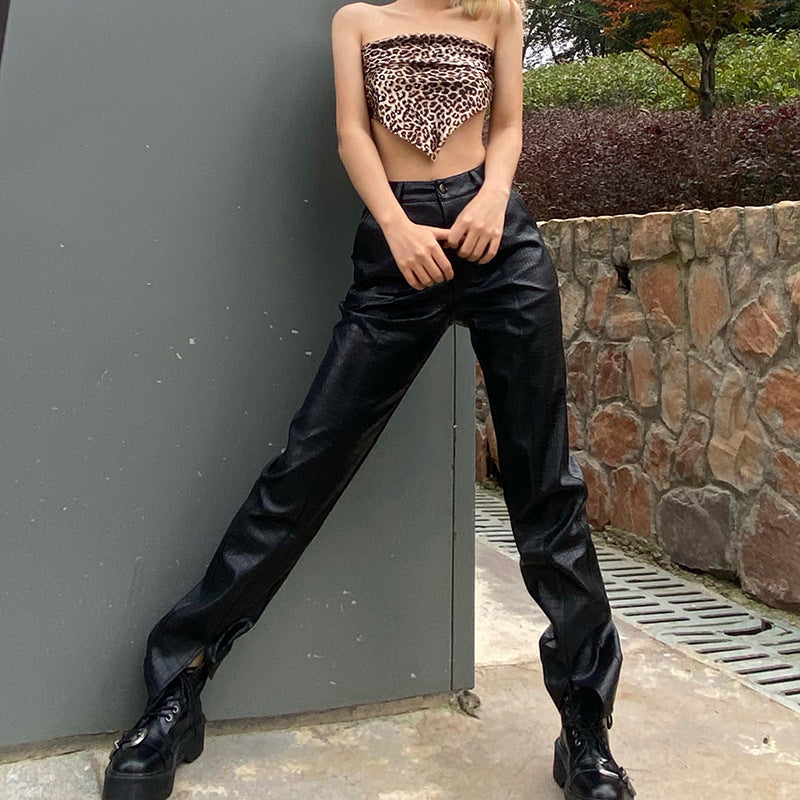 Karina wears Express faux leather pants with body suit and